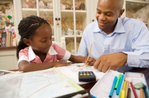 black-dad-helping-girl-with-homework
