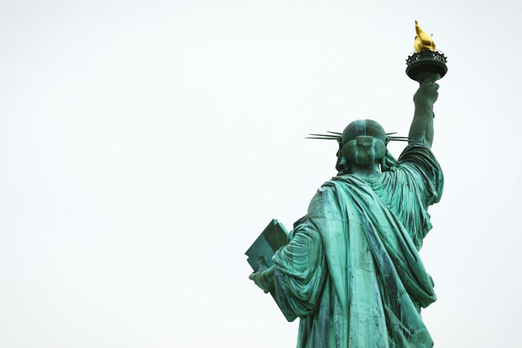 The Statue of Liberty reads: "Give me your tired, your poor, your huddled masses yearning to breathe free..."