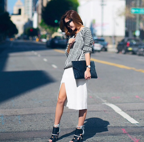 Achieve an hourglass look by coupling a chunky sweater with a midi length skirt; leave the sweater untucked.