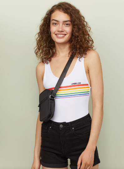 Person wearing H&M bodysuit for Pride Month